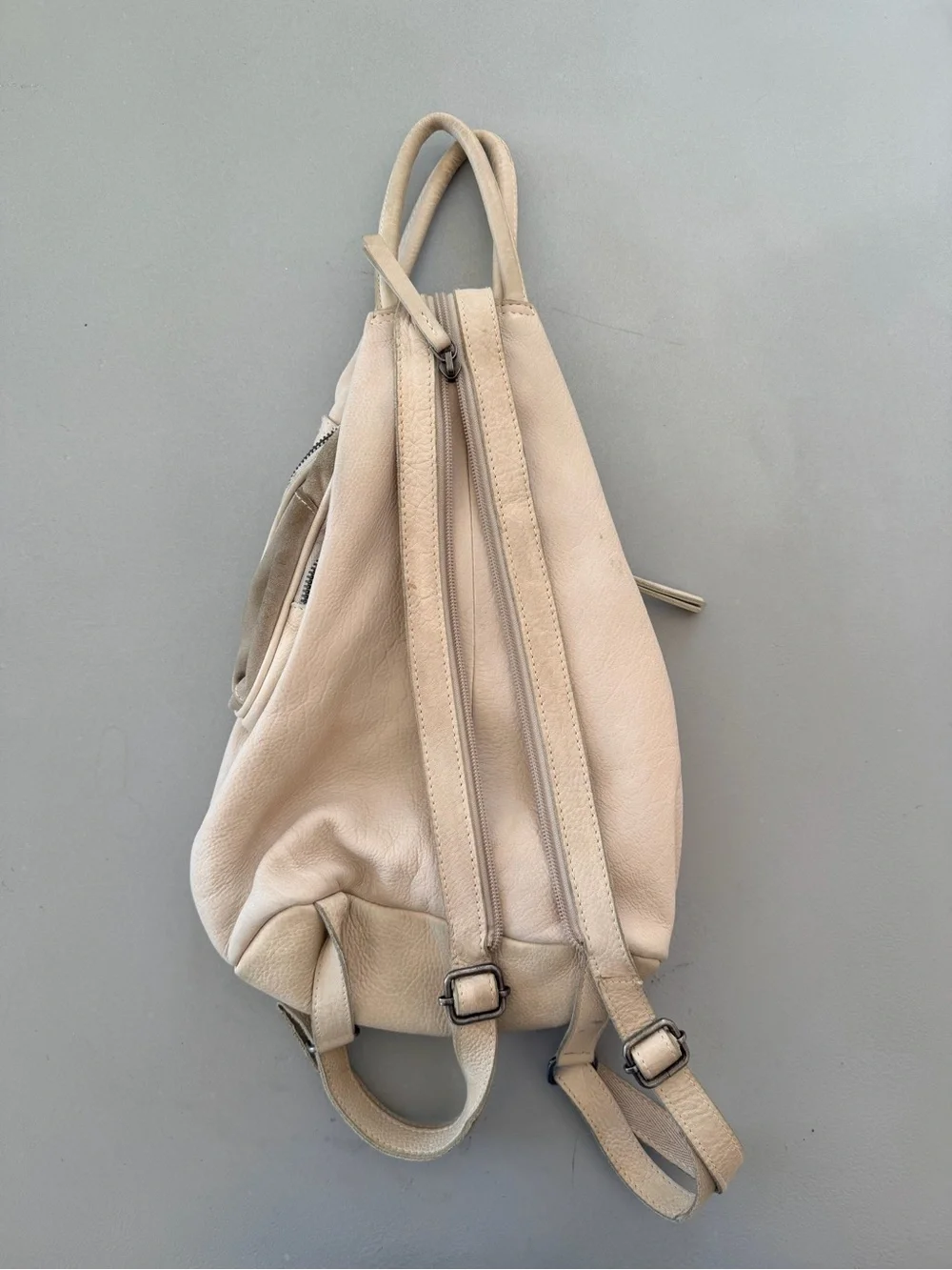 We The Free Cream Leather Sling Backpack
